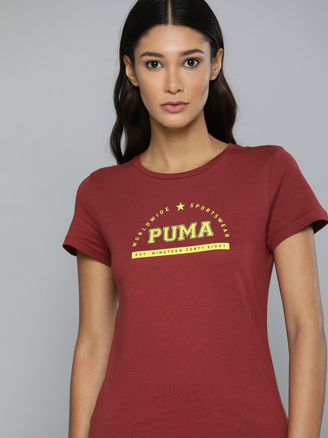 

Puma Women Brown Yellow Brand Logo Printed Pure Cotton T-shirt