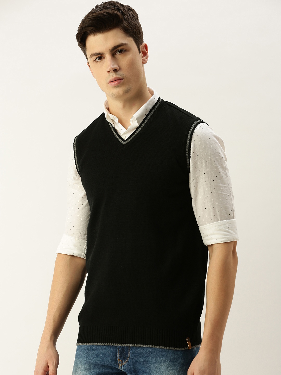 

Peter England Men Black Solid Sweater Vest Sweater