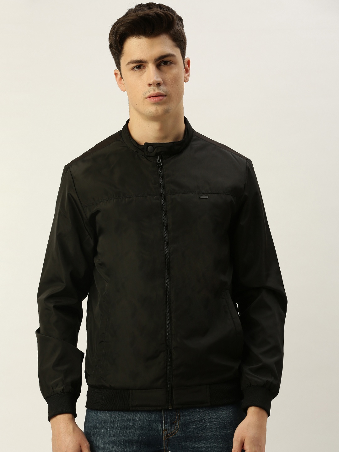 

Peter England Men Black Solid Windcheater and Water Resistant Open Front Jacket