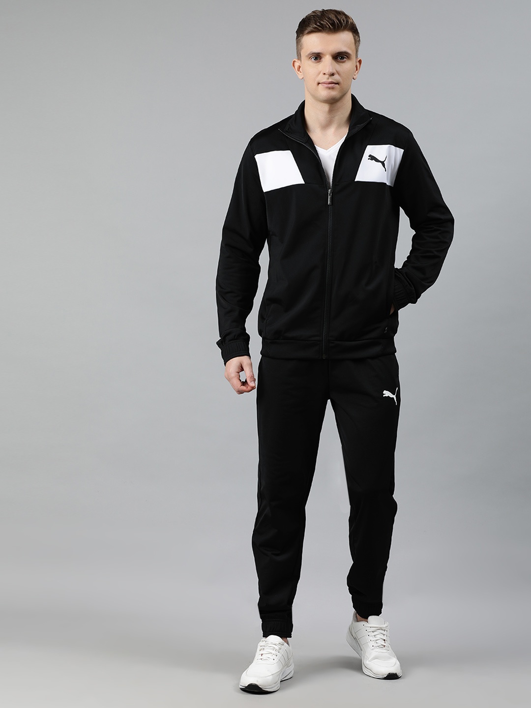 

Puma Men Black & White Colourblocked Slim Fit Techstripe Tricot Tracksuit