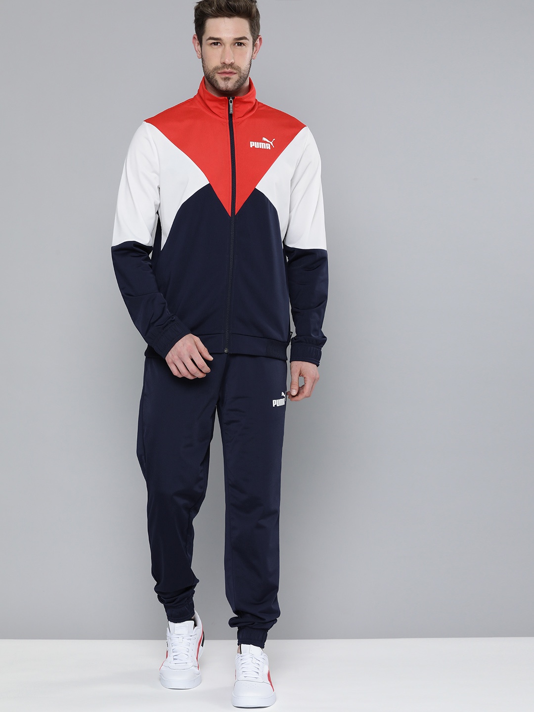 

Puma Men Navy Blue & Red Colourblocked Tracksuits