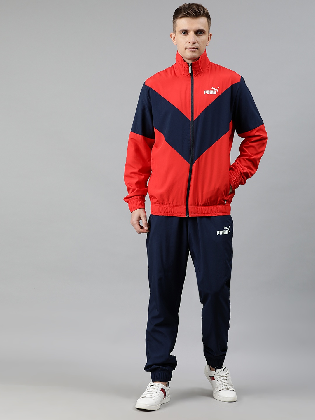 

Puma Men Red & Navy Blue Colourblocked Woven Tracksuit