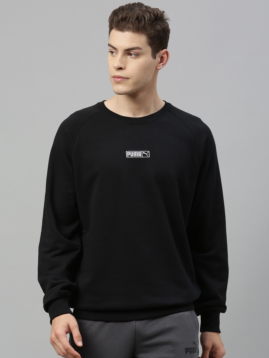 

Puma Men Black Solid Sweatshirt