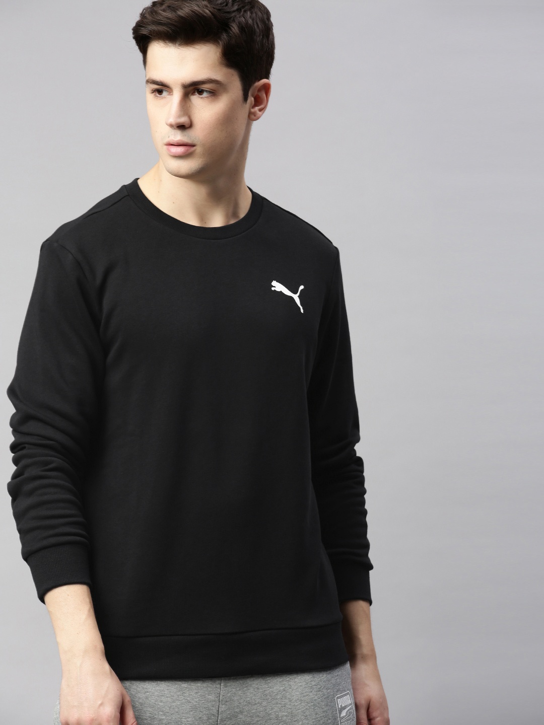 

Puma Men Black Solid ESS Logo Crew Sweatshirt