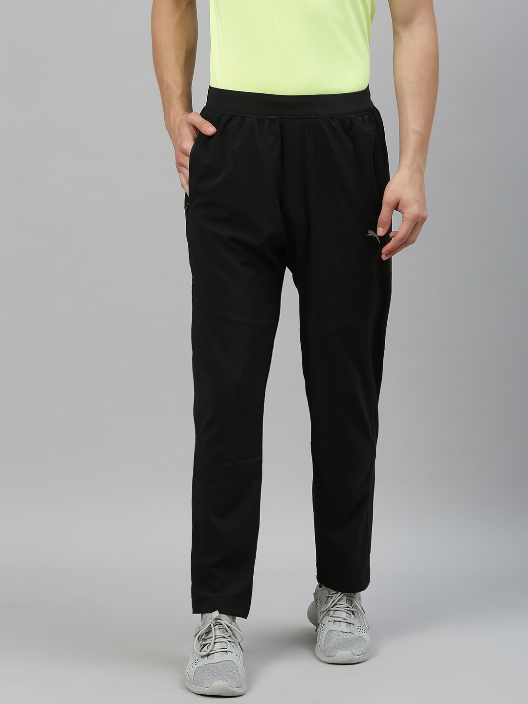 

Puma Men Black Relaxed Fit Tapered dryCELL Woven Running Track Pants