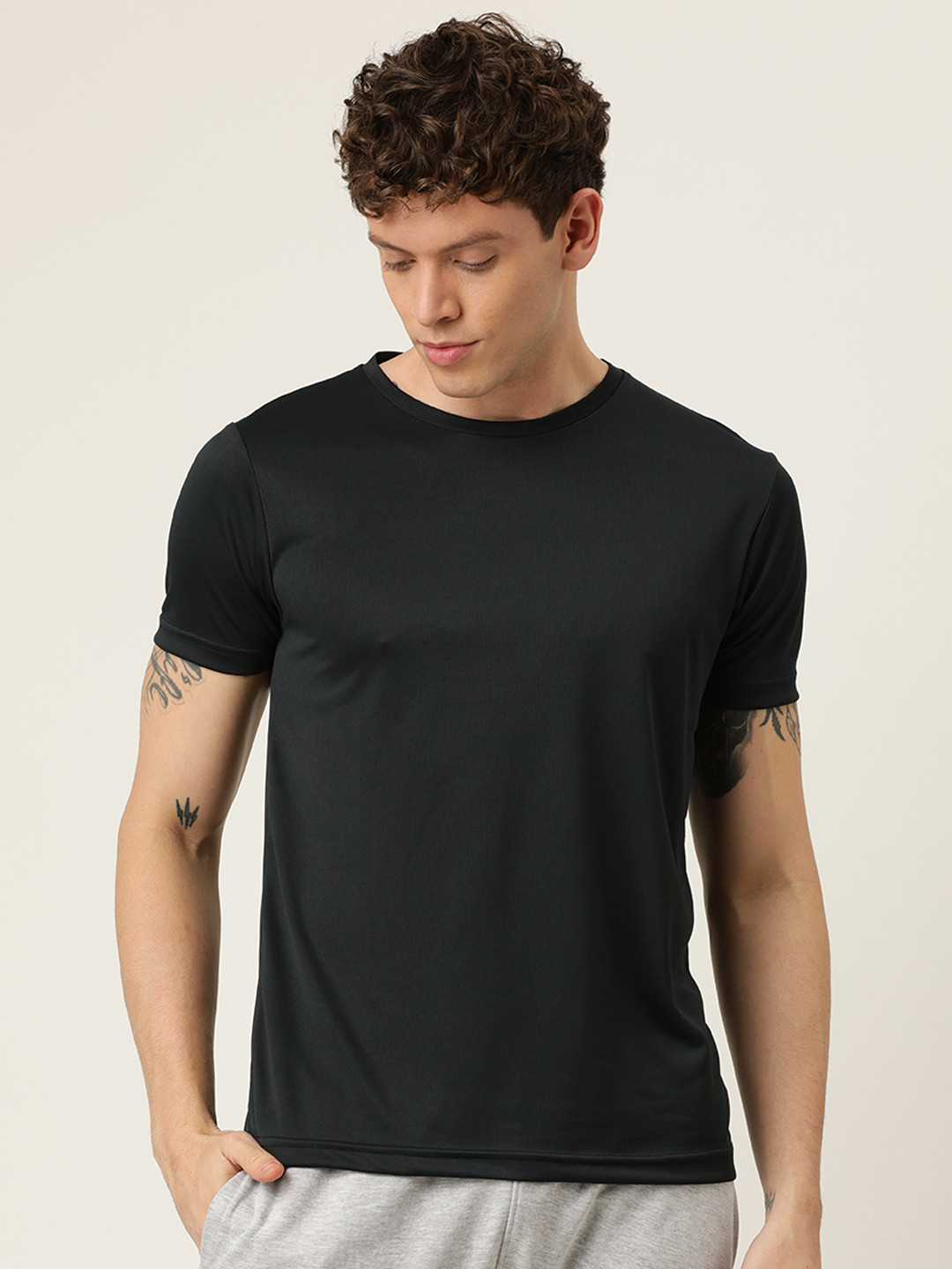 

Proline Active Men Black Solid Round Neck T-shirt