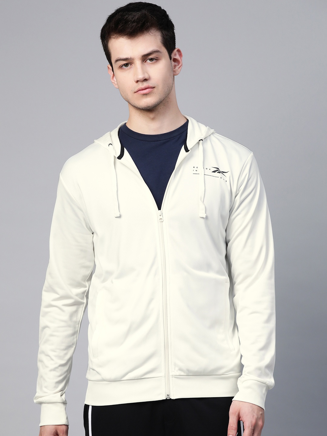

Reebok Men Off-White Solid Graphic Training Track Top