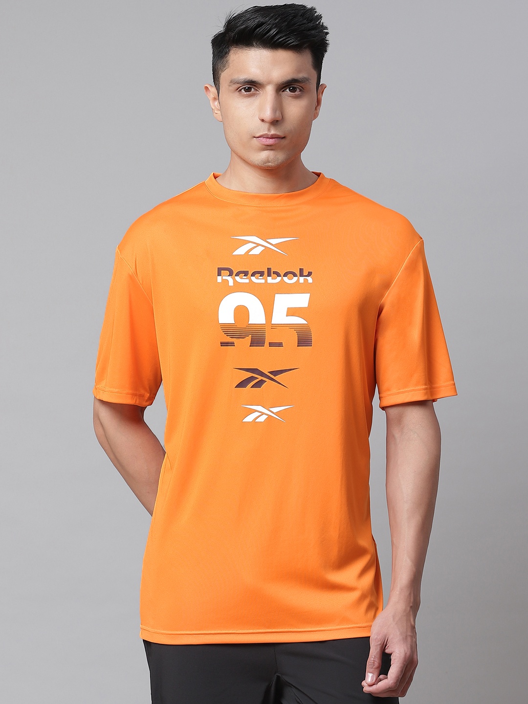 

Reebok Men Orange & White Printed Relaxed Fit MYT T-shirt