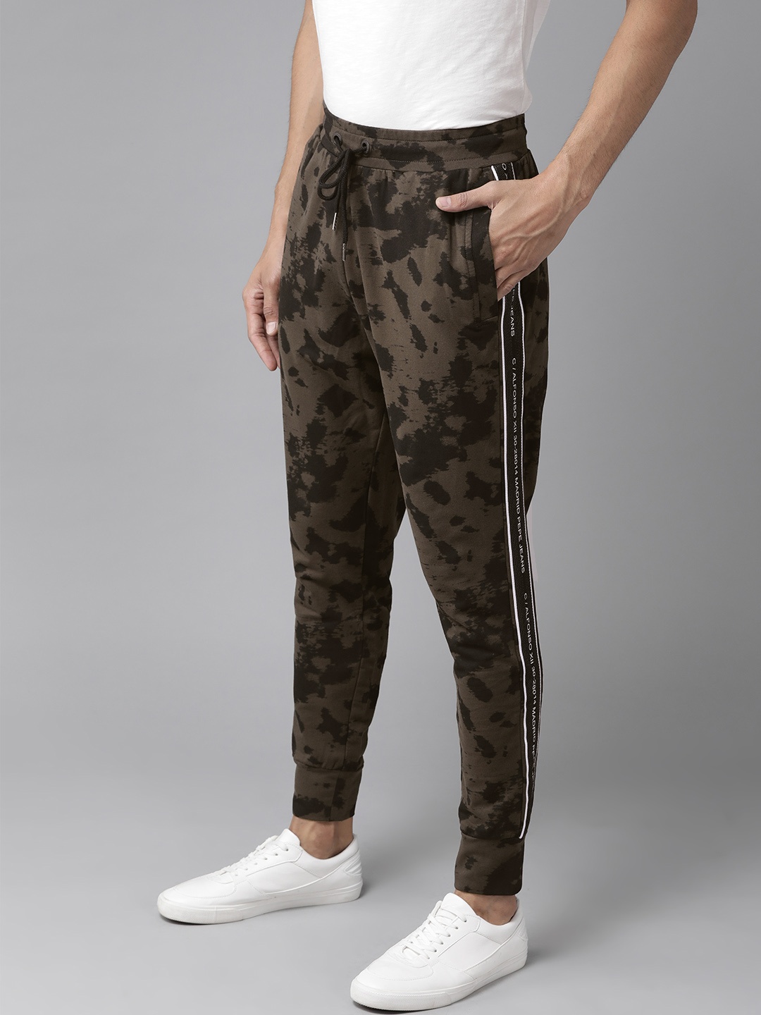 

Pepe Jeans Men Olive Green & Black Abstract Print Joggers