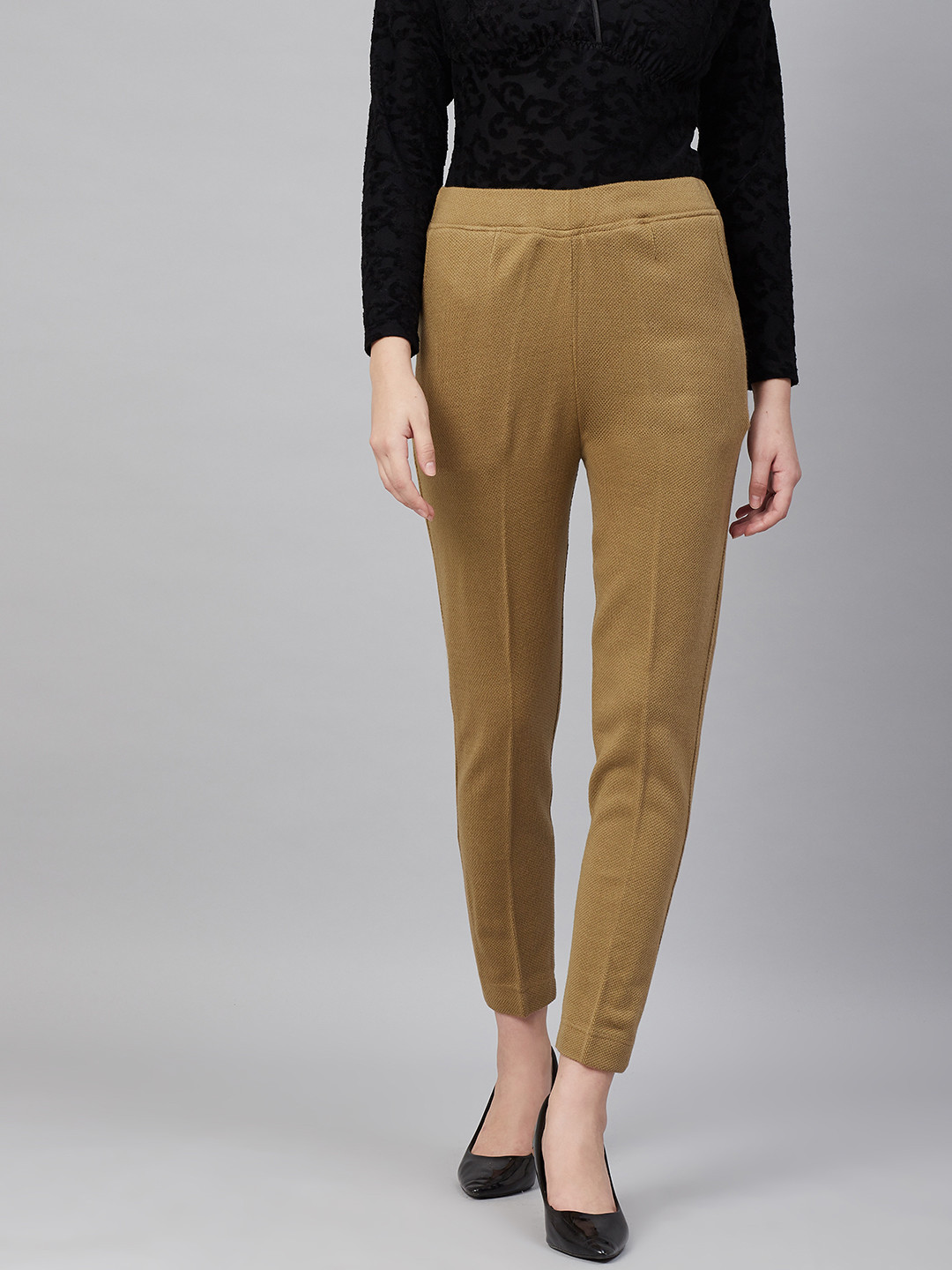 

Cayman Women Olive Green Solid Regular Fit Regular Trousers