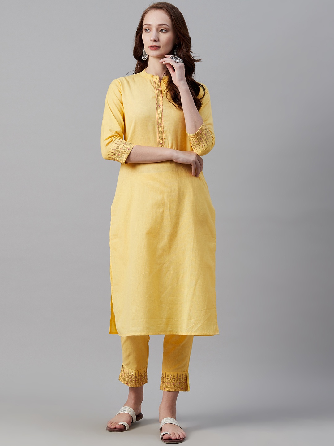 

Cayman Women Yellow Solid Kurta with Trousers