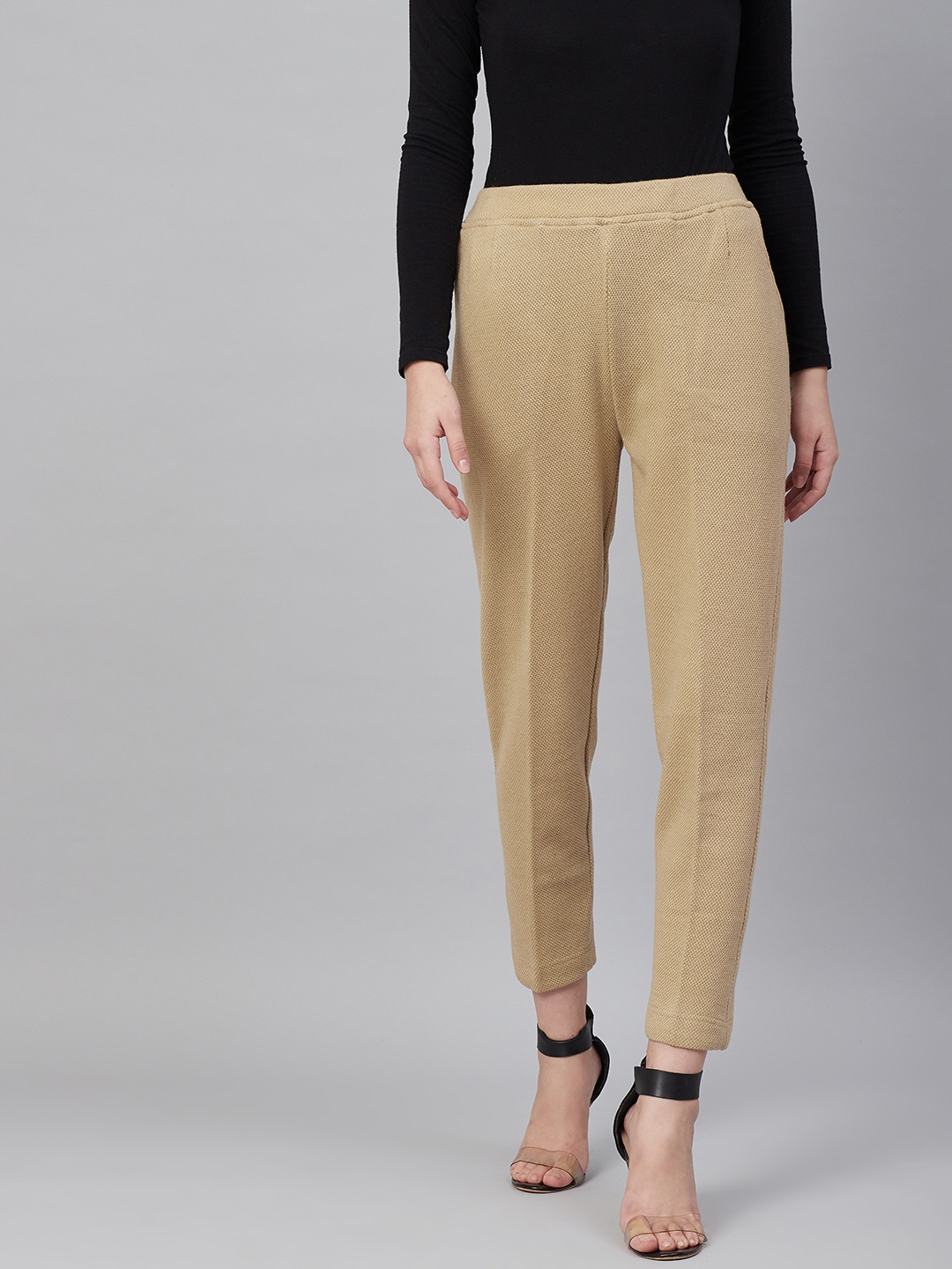 

Cayman Women Beige Solid Regular Fit Trousers