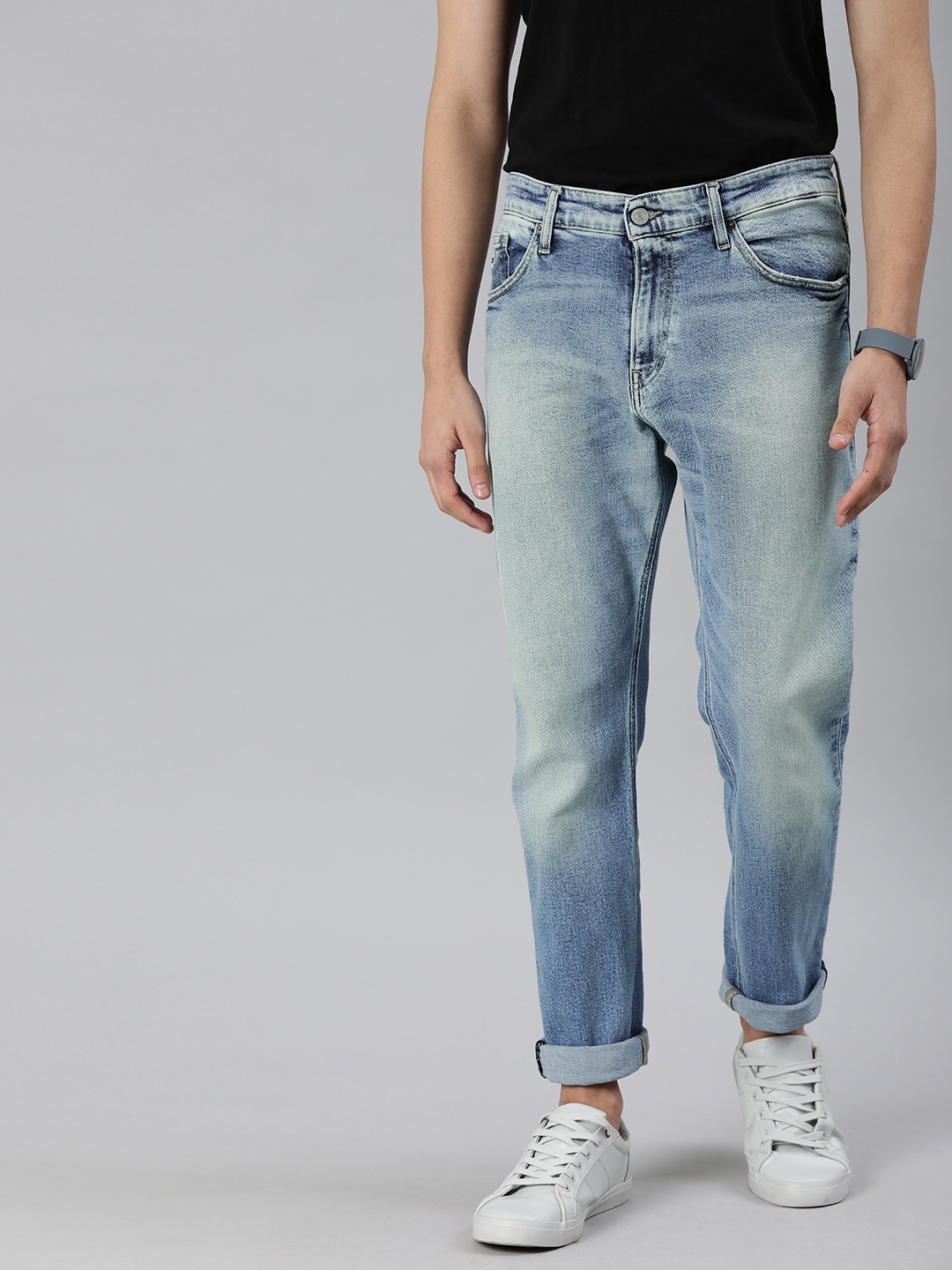 

Tommy Hilfiger Men Blue Ryan Straight Fit Mid-Rise Clean Look Stretchable Jeans