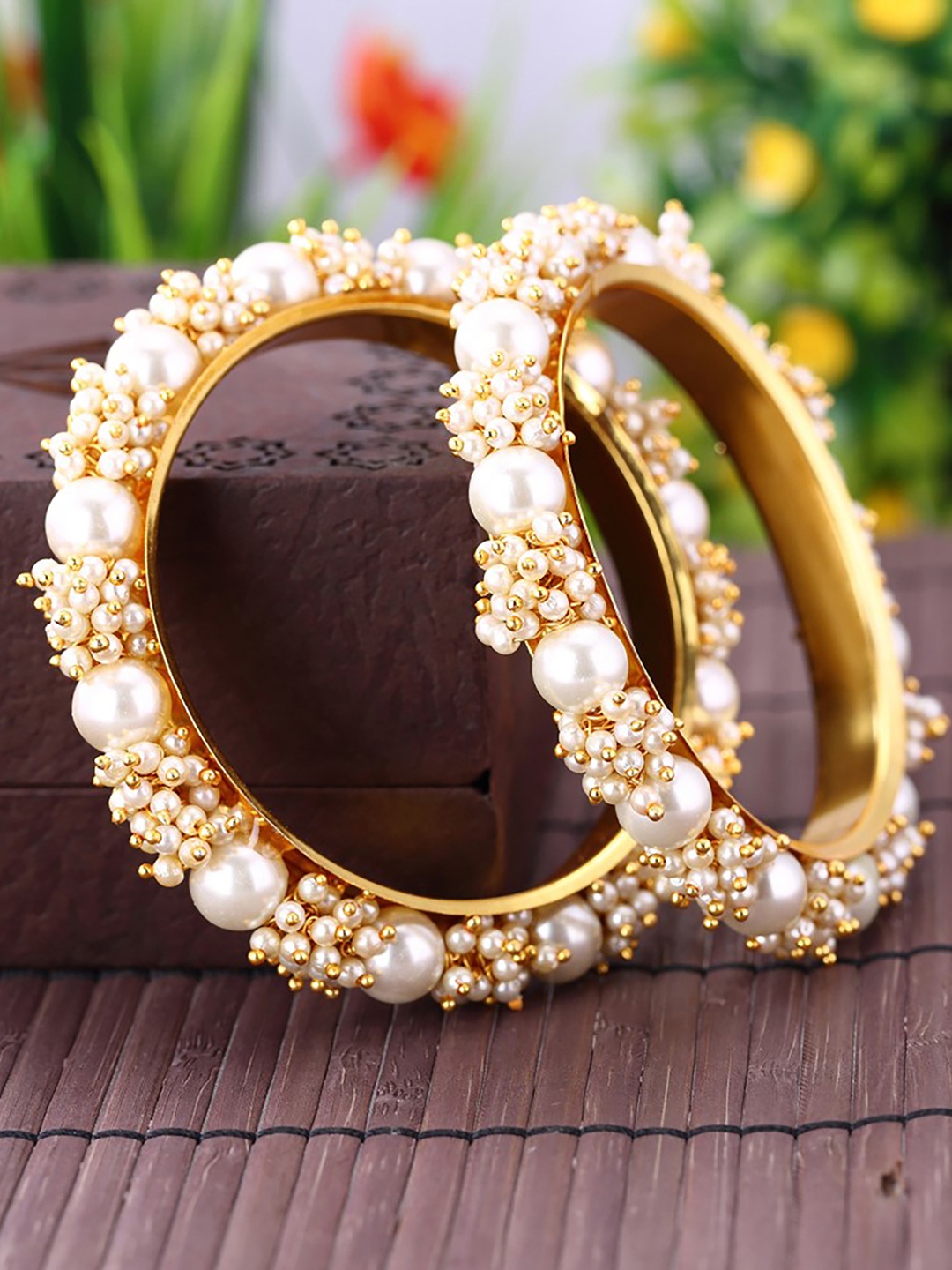 

Sukkhi Set Of 2 Gold-Plated & Off-White Pearl Beaded Antique Bangles