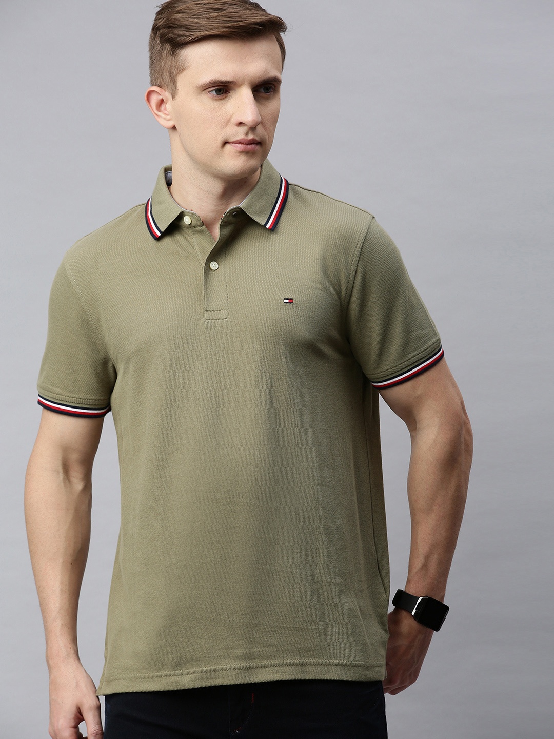 

Tommy Hilfiger Men Olive Green Solid Polo Collar T-shirt with Contrast Tipping