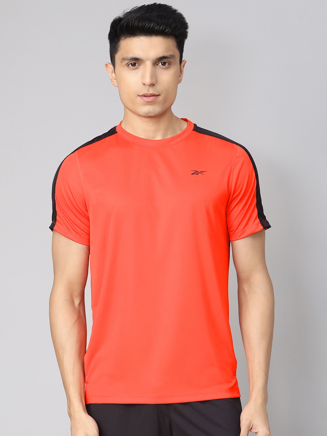 

Reebok Men Red Solid Wor Tech T-Shirt