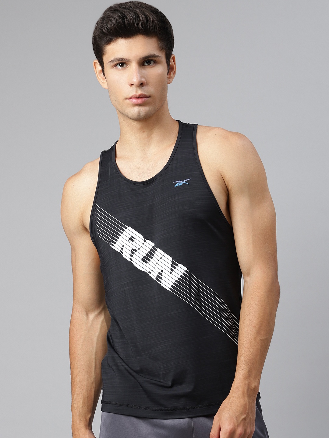 

Reebok Men Black & White Printed Running OSR ACTIVCHILL SINGLET T-Shirt