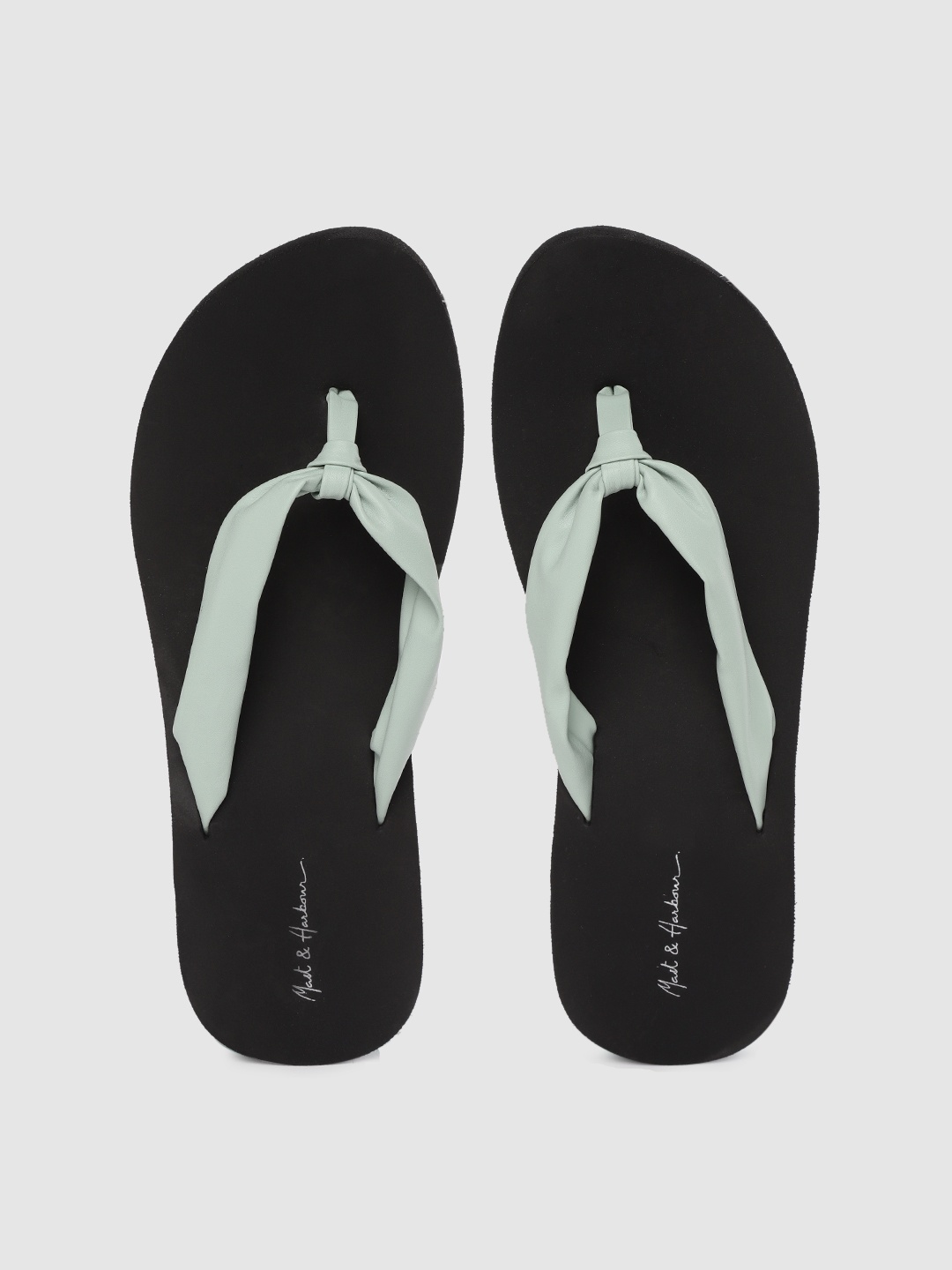 

Mast & Harbour Women Green & Black Solid Thong Flip-Flops with Knot Detail