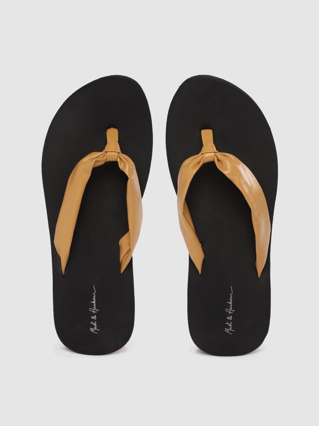 

Mast & Harbour Women Beige & Black Solid Thong Flip-Flops with Knot Detail
