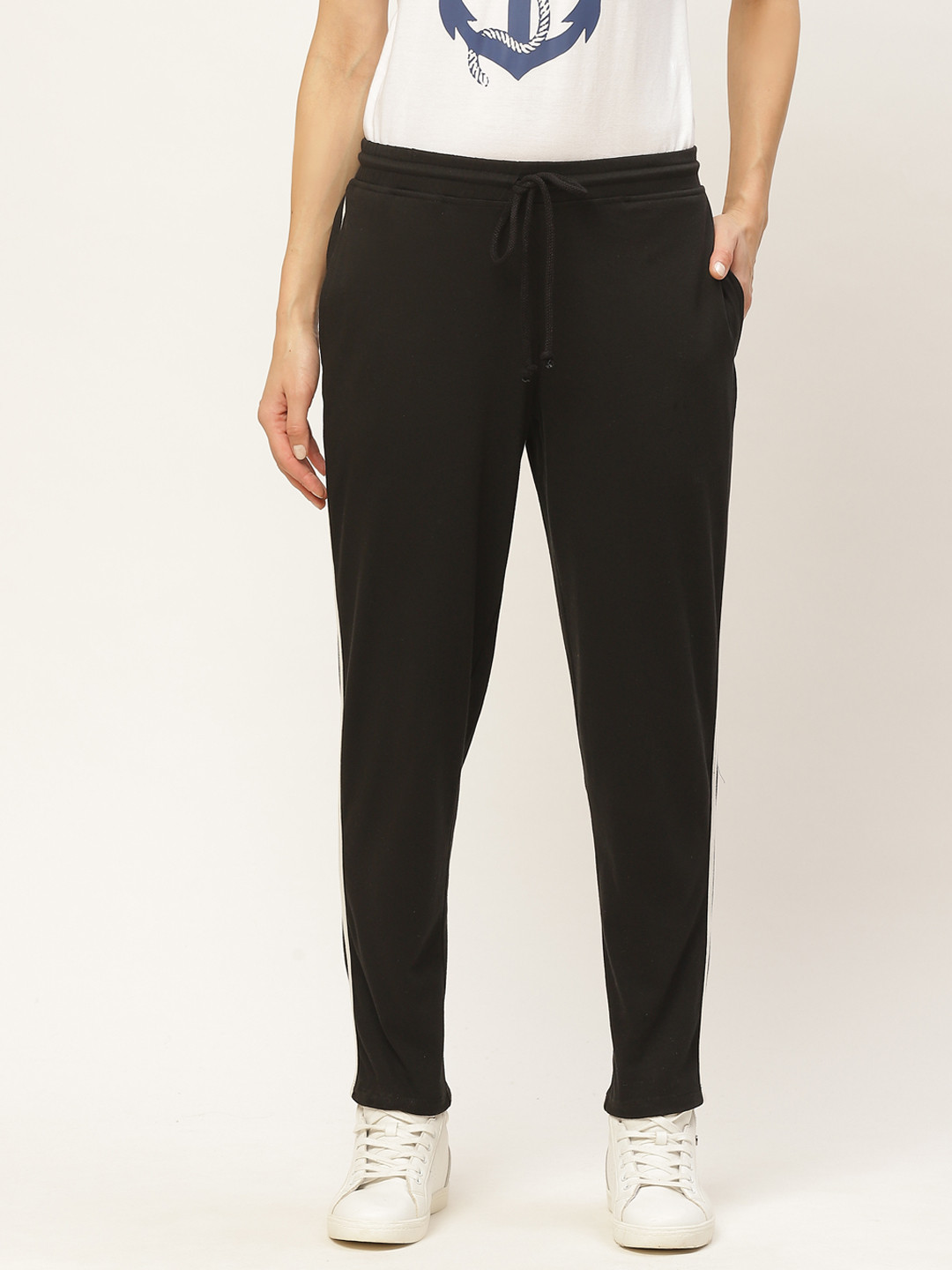 

Rute Women Black Solid Track Pants