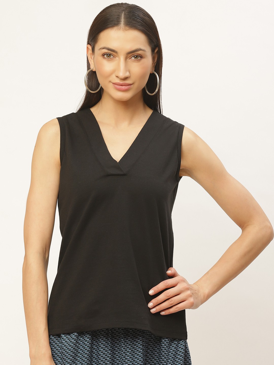 

Rute Women Black Solid Styled Back Top