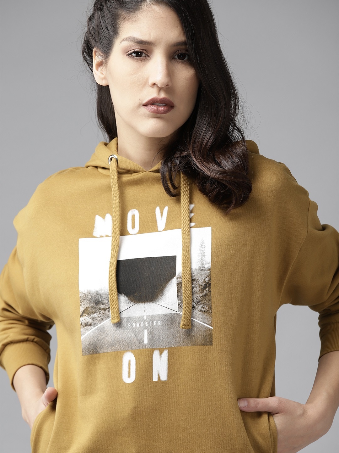 

Roadster Women Mustard Brown & White Printed Hooded Sweatshirt