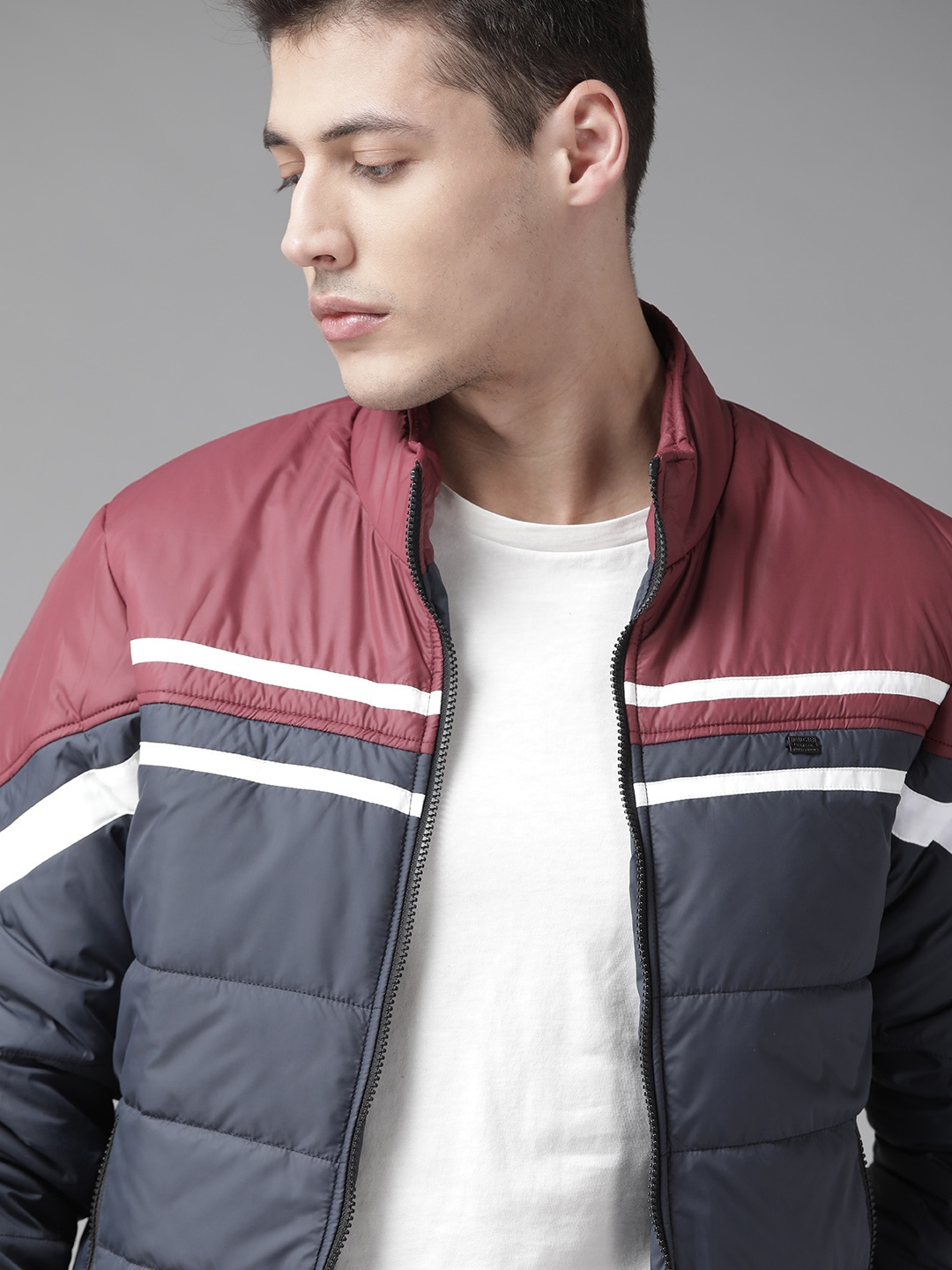 

Roadster Men Navy Blue & Burgundy Colourblocked Padded Jacket