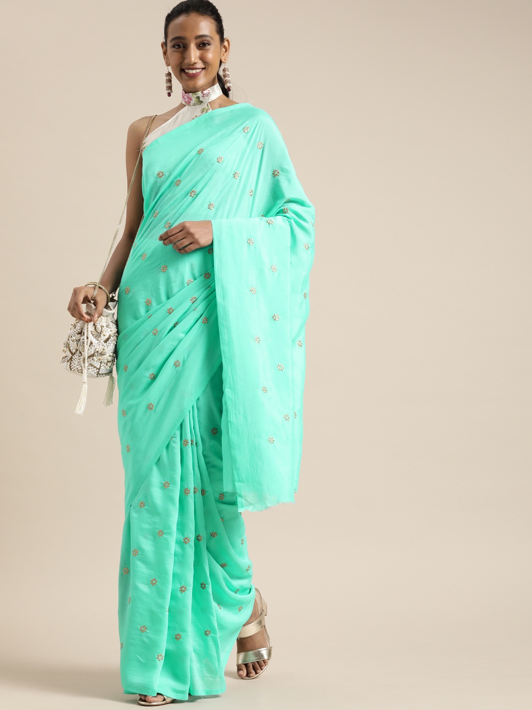 

SHAVYA Turquoise Blue Embroidered Pure Georgette Saree