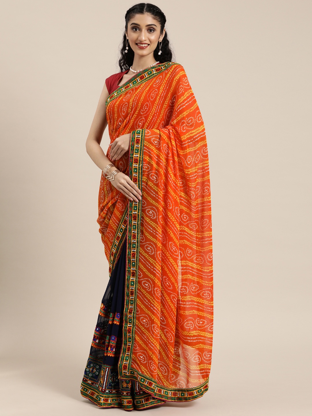 

Mitera Orange & Navy Blue Pure Georgette Printed Bandhani Saree With Kutchi Embroidery