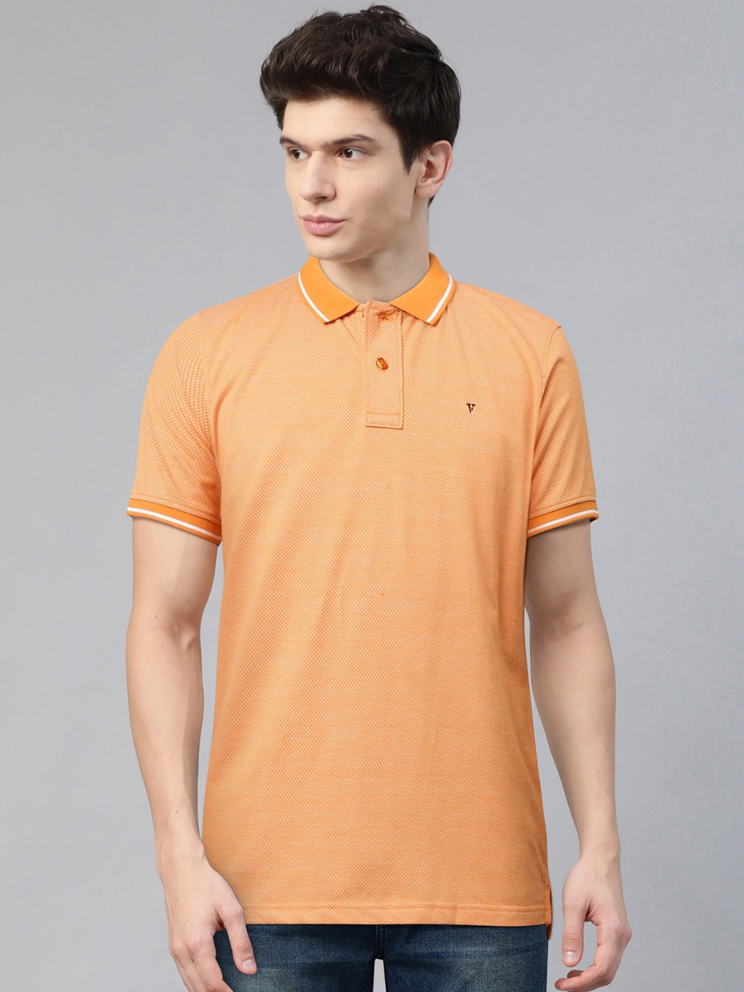 

Van Heusen Sport Men Orange & White Self Design Polo Collar T-shirt