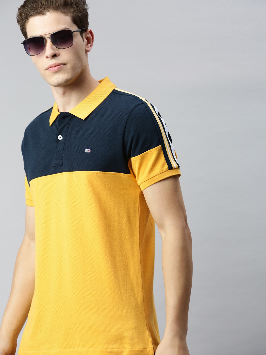 

Arrow Sport Men Yellow Colourblocked Polo Collar T-shirt