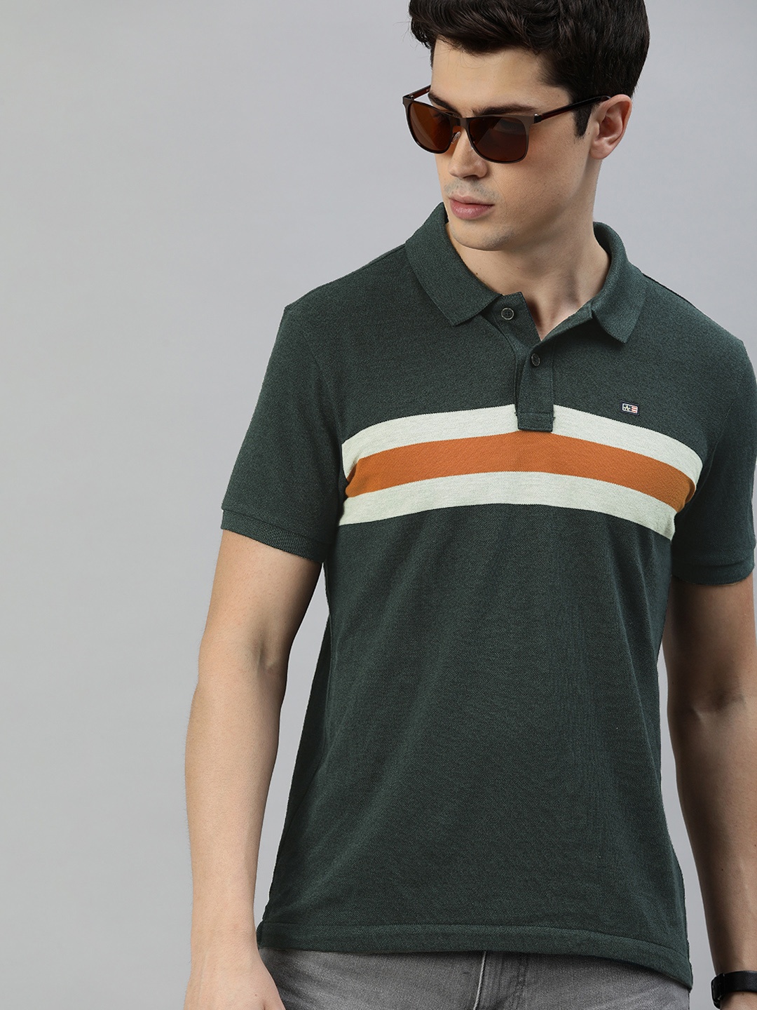 

Arrow Sport Men Green & Cream-Coloured Striped Polo Collar T-shirt