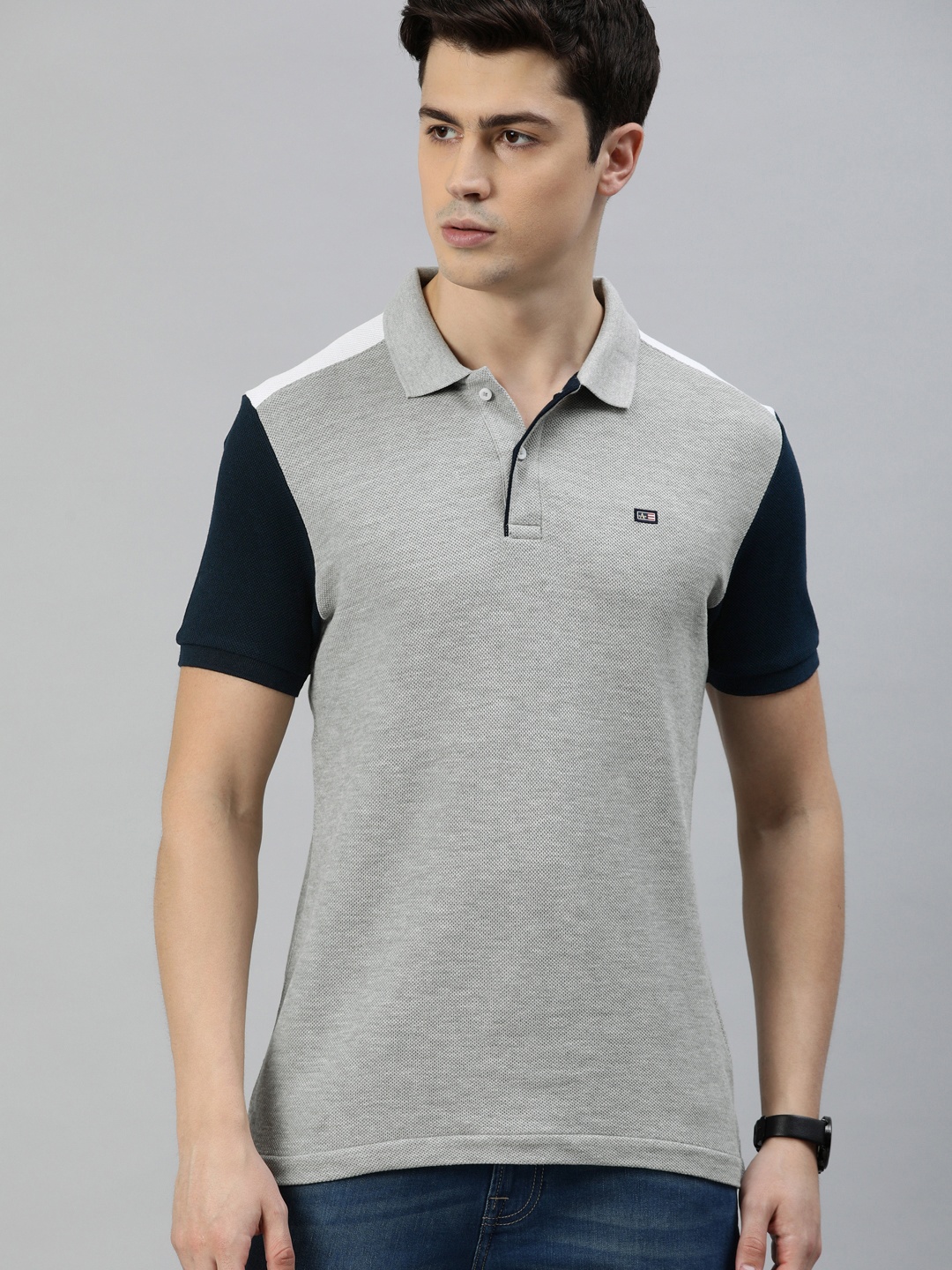 

Arrow Sport Men Grey Solid Polo Collar T-shirt