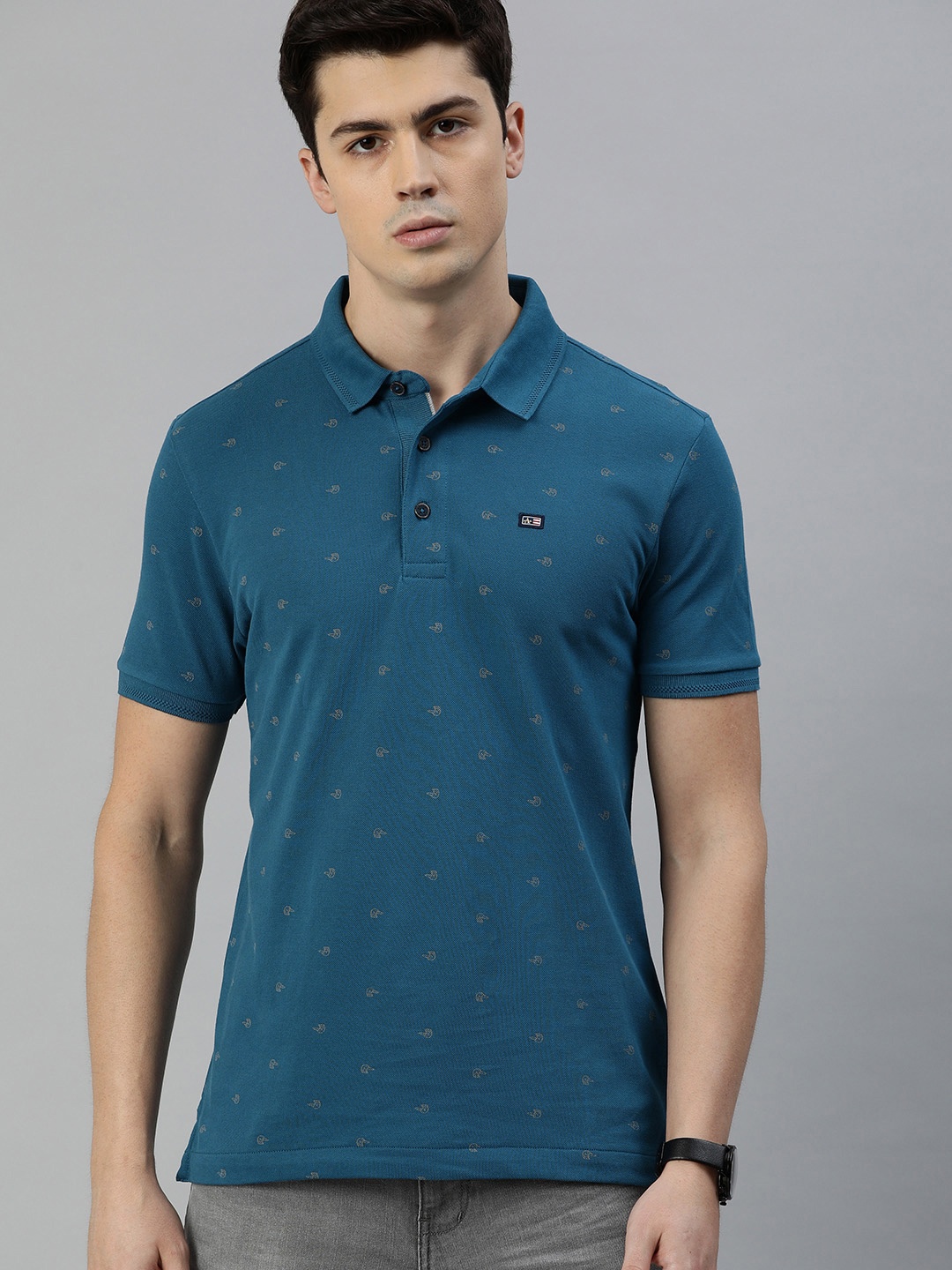 

Arrow Sport Men Teal Blue Printed Polo Collar Pure Cotton T-shirt