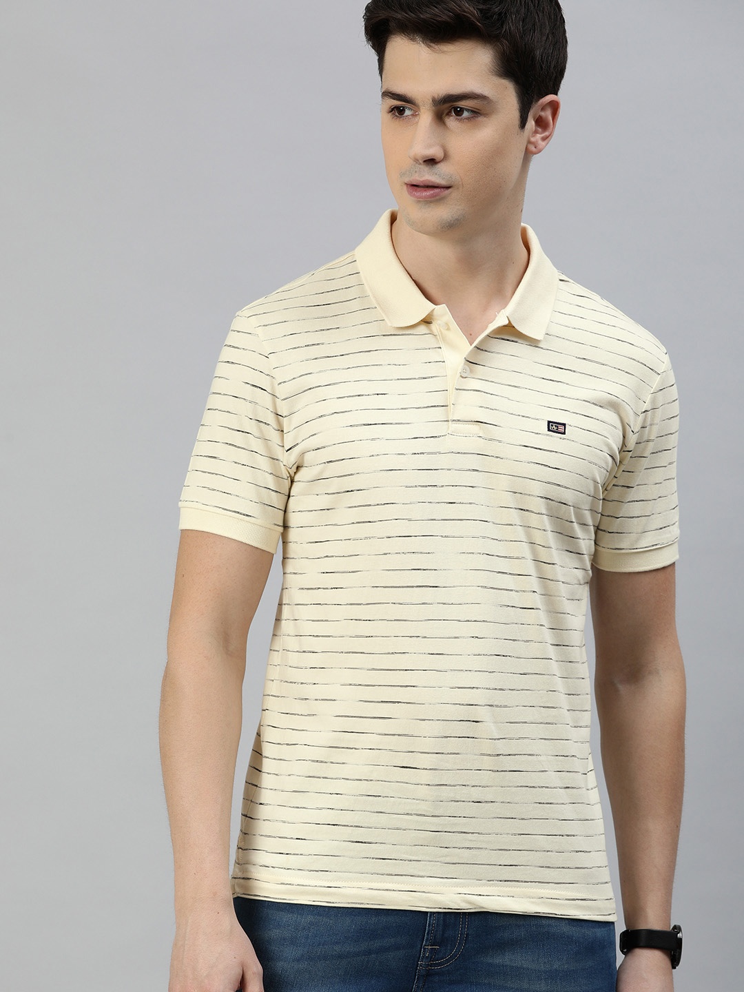 

Arrow Sport Men Off-White Striped Polo Collar T-shirt