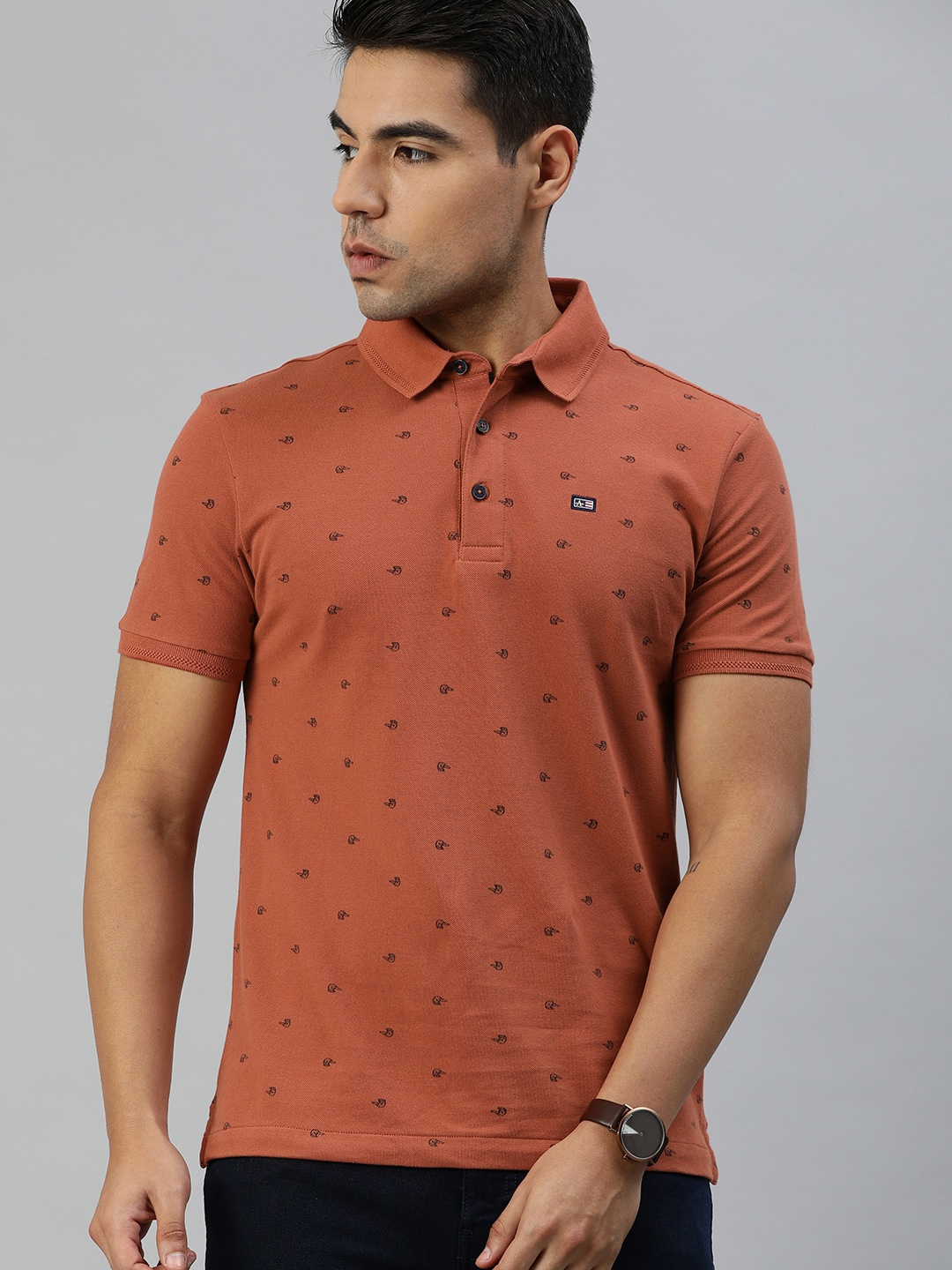 

Arrow Sport Men Rust Orange Black Pure Cotton Printed Polo Collar Pure Cotton T-shirt