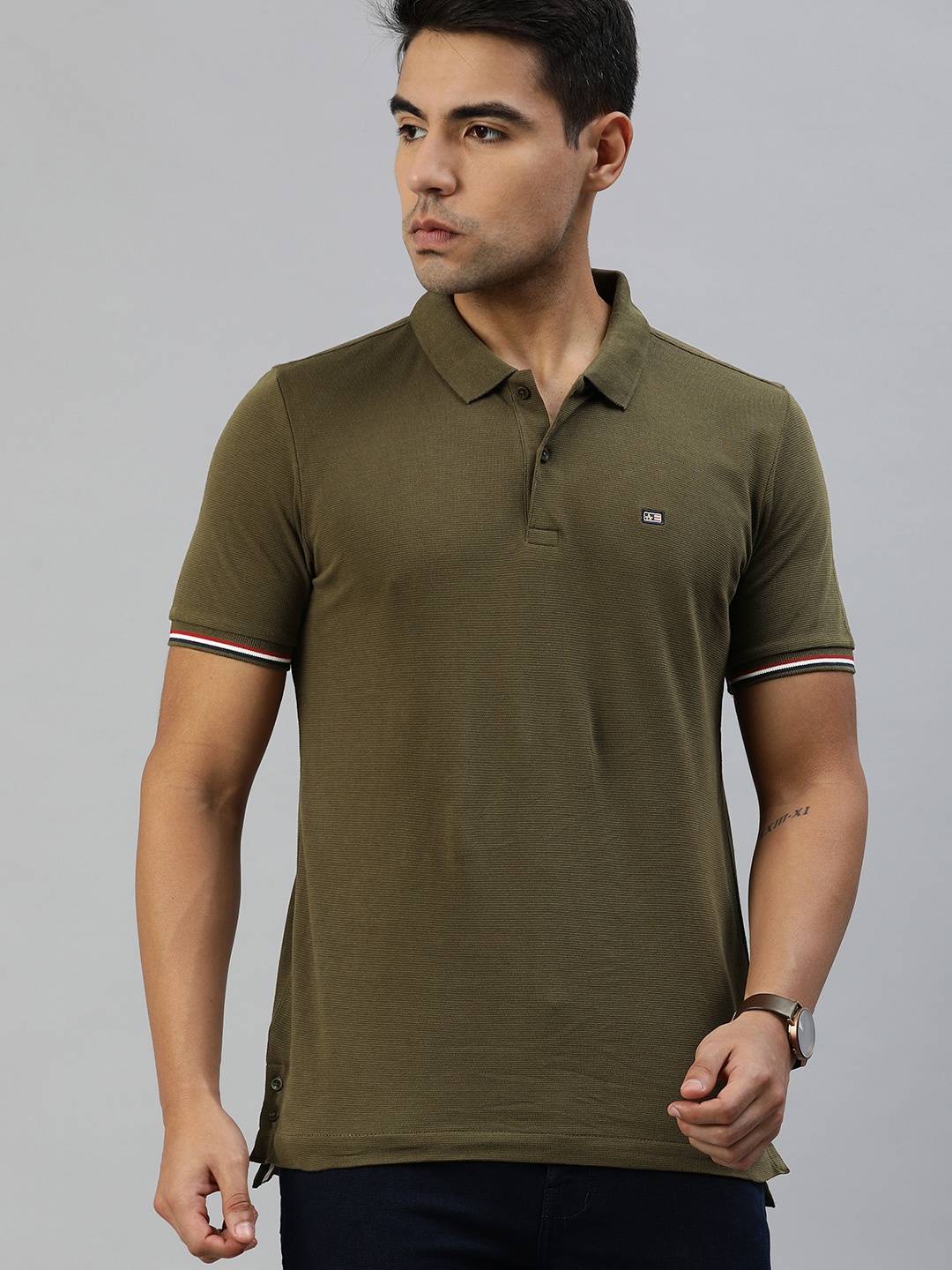 

Arrow Sport Men Olive Green Solid Polo Collar T-shirt