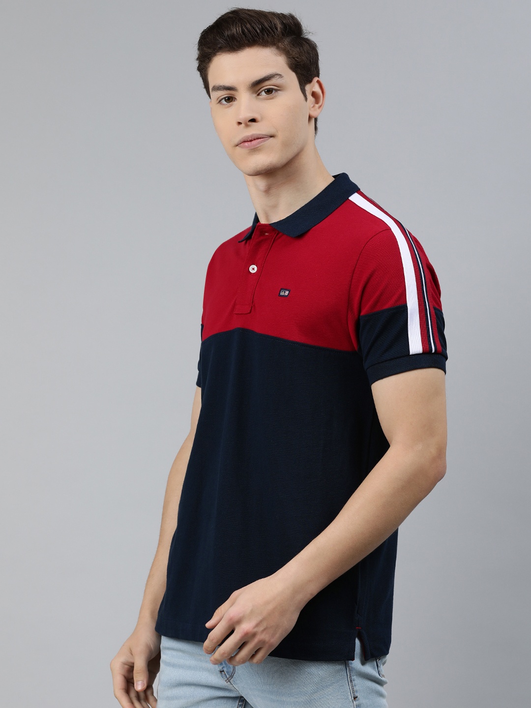 

Arrow Sport Men Navy Blue Colourblocked Polo Collar T-shirt