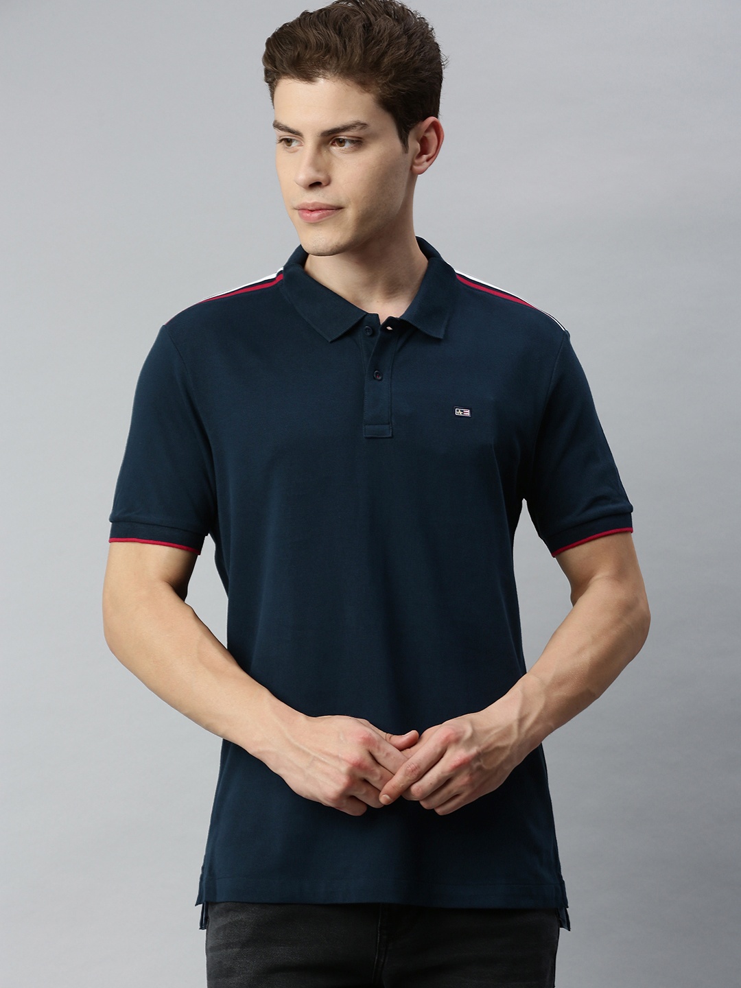 

Arrow Sport Men Navy Blue Solid Polo Collar T-shirt