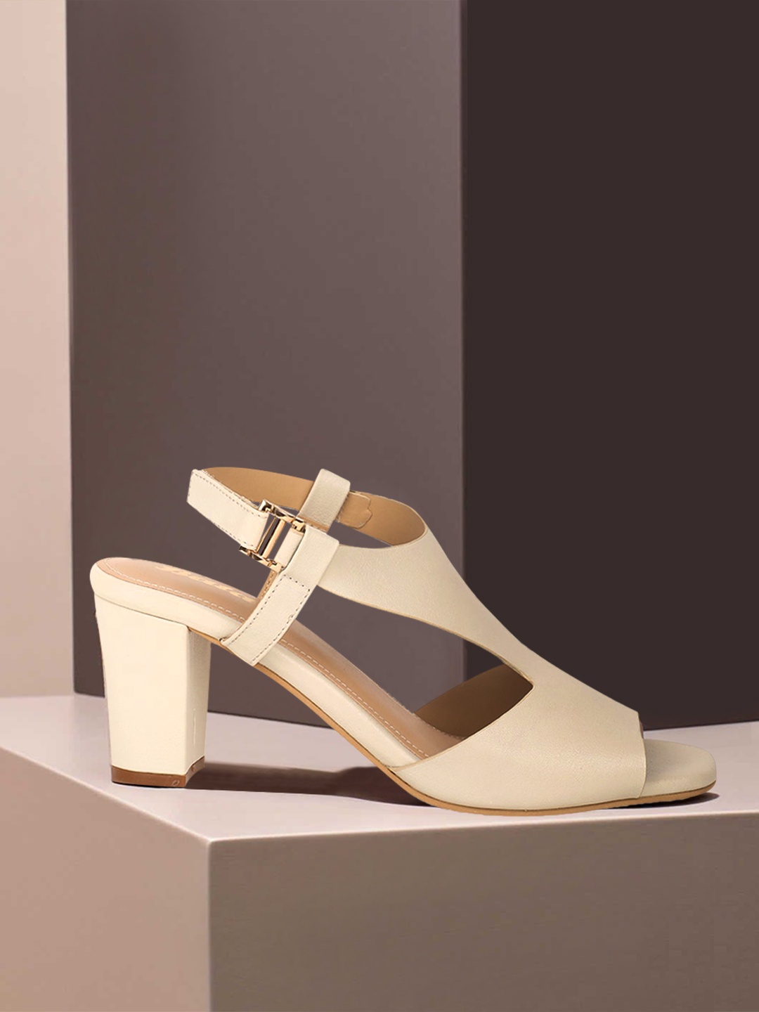 

Bata Women Beige Solid Heels