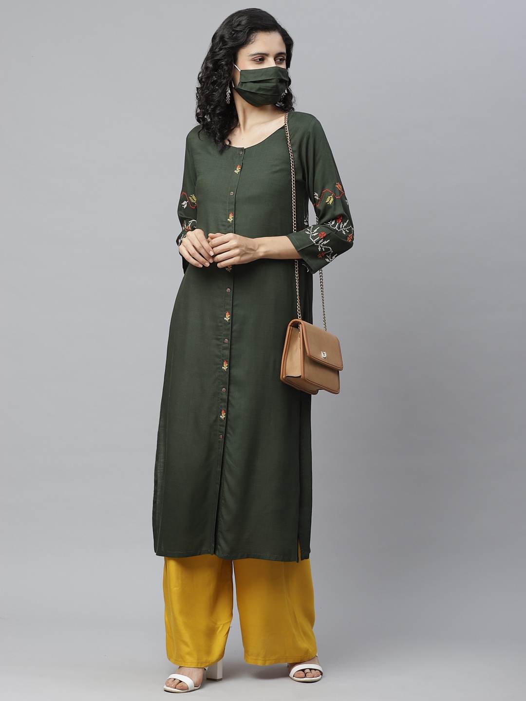 

Cayman Women Olive Green Solid Straight Kurta