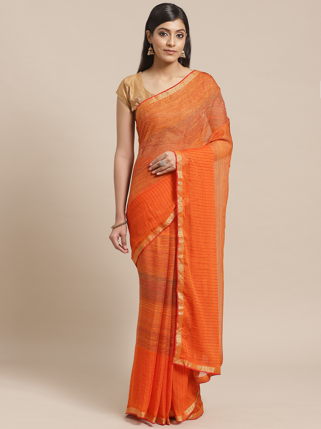 

Shaily Orange & Golden Poly Georgette Woven Design Saree