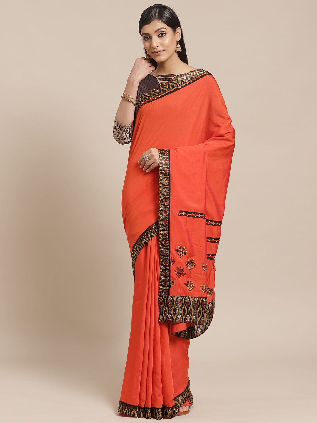 

Shaily Coral Red Solid Saree