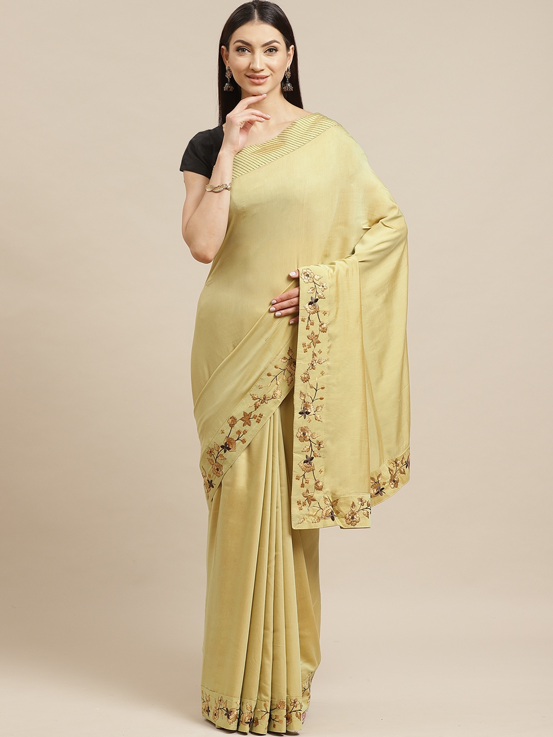 

Shaily Beige Solid Saree