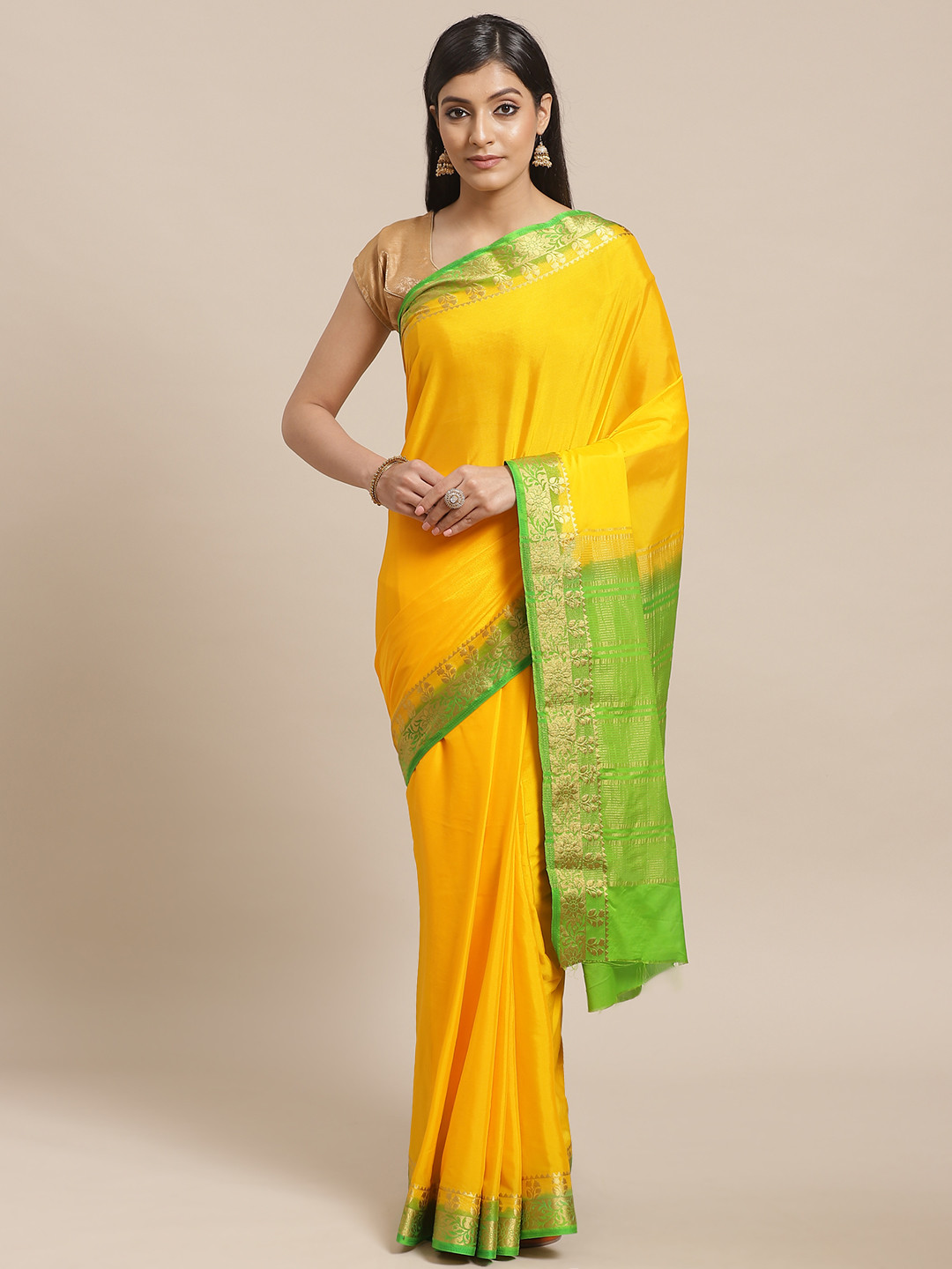 

Shaily Yellow & Green Solid Kanjeevaram Saree