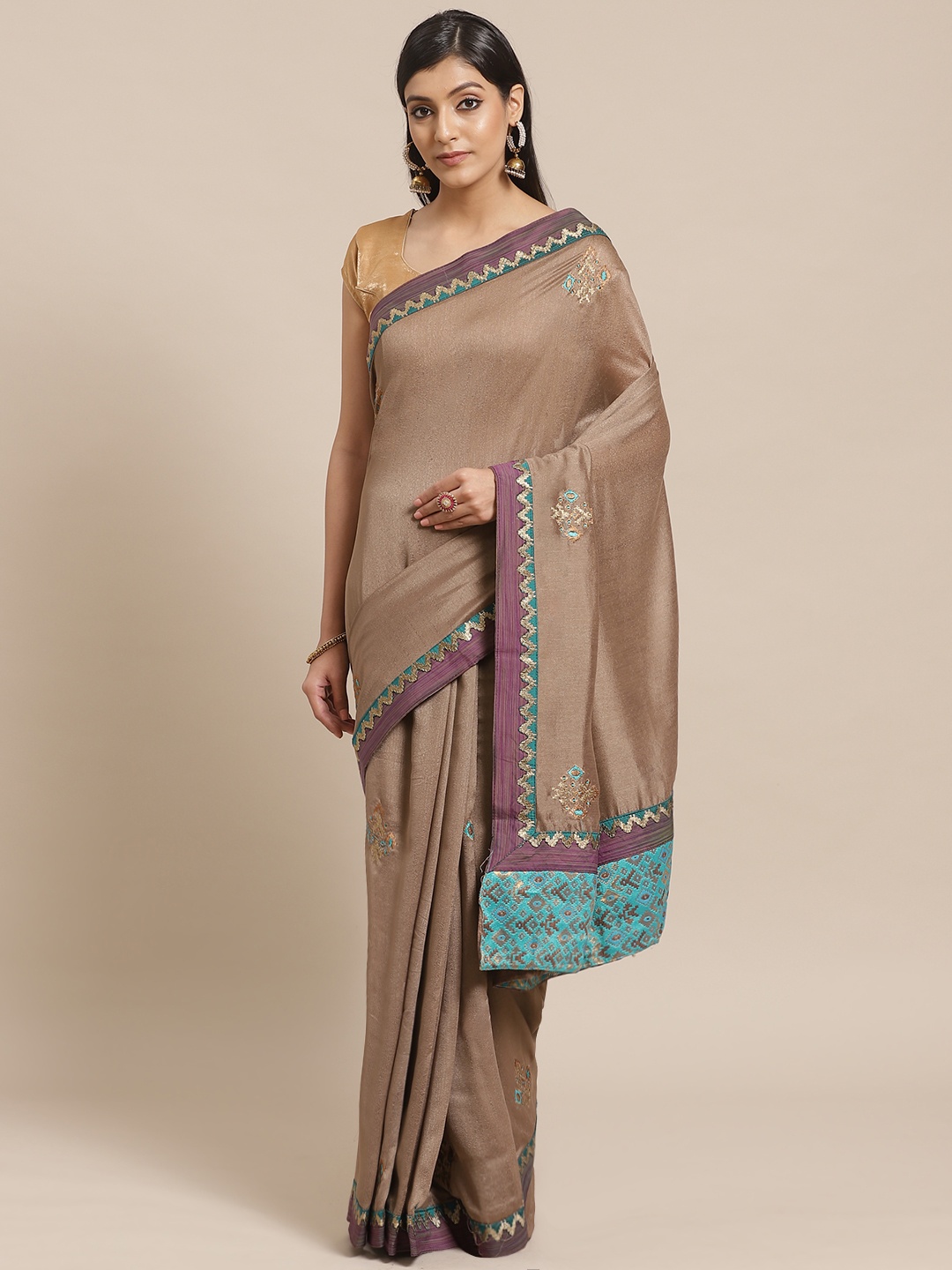 

Shaily Taupe Embroidered Saree