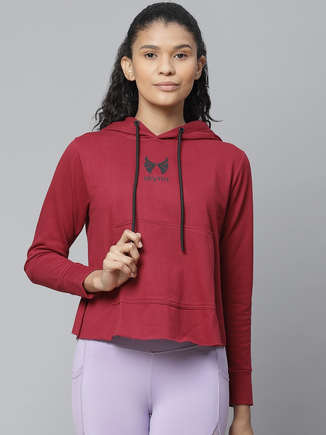 

skyria Women Maroon Styled Back Solid Hooded Training Sweatshirt