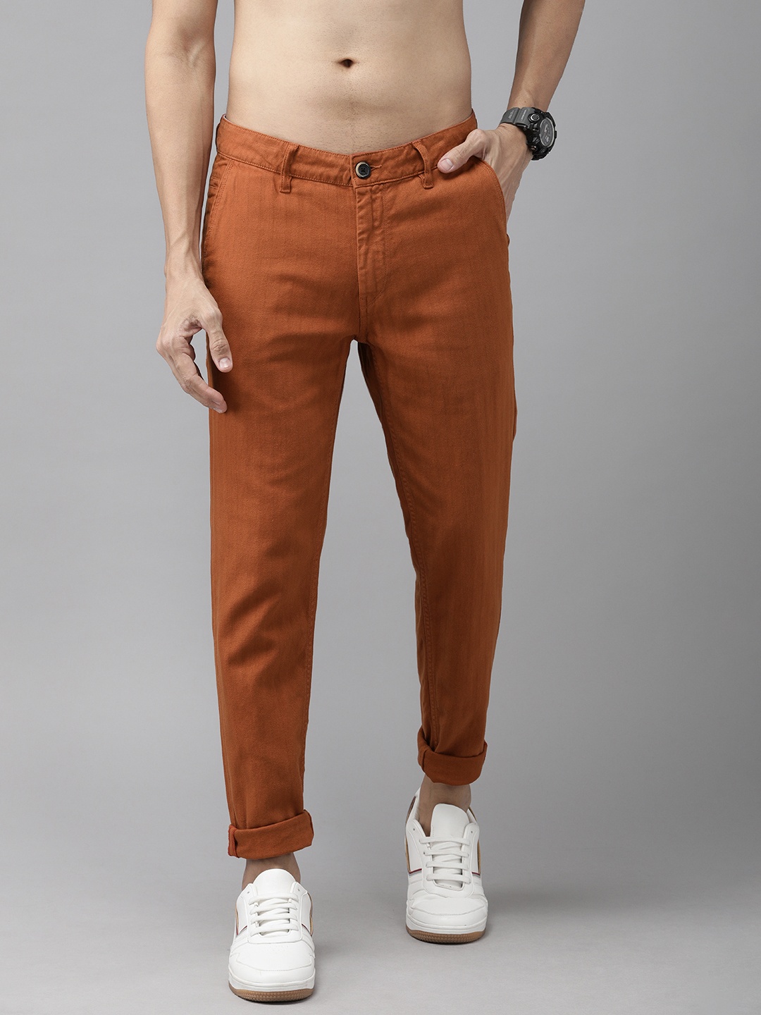 

Roadster Men Rust Brown Regular Fit Self Design Regular Trousers