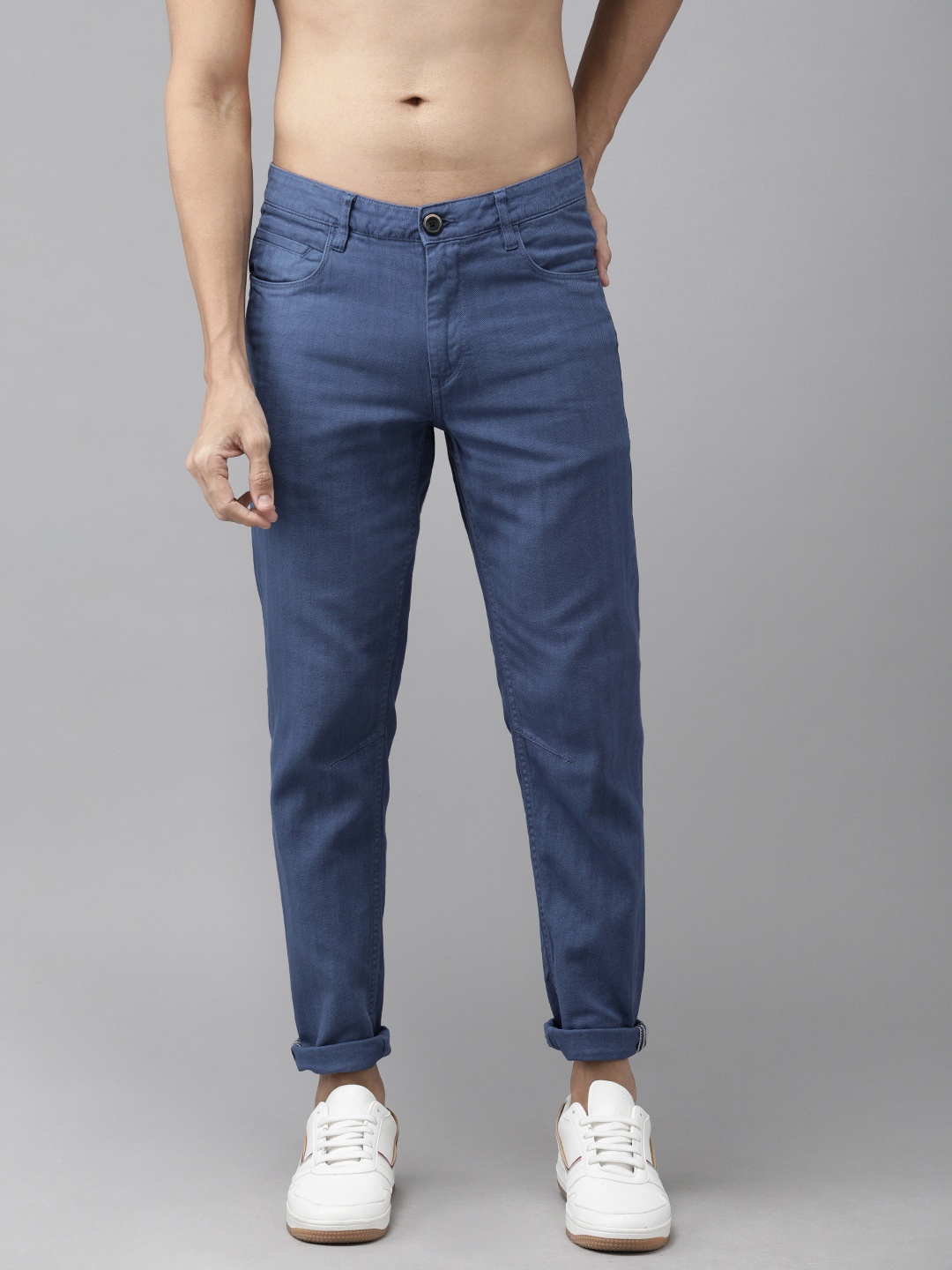 

Roadster Men Blue Regular Fit Herringbone Self Design Regular Trousers