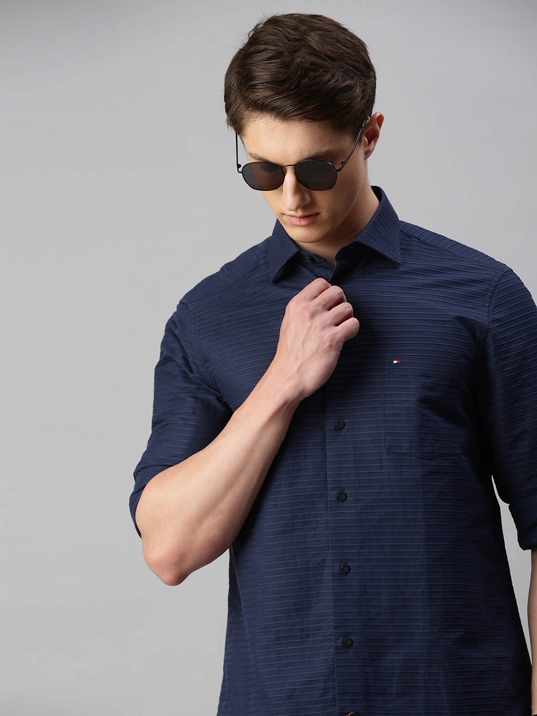 

Tommy Hilfiger Men Navy Blue Regular Fit Self-Striped Casual Shirt